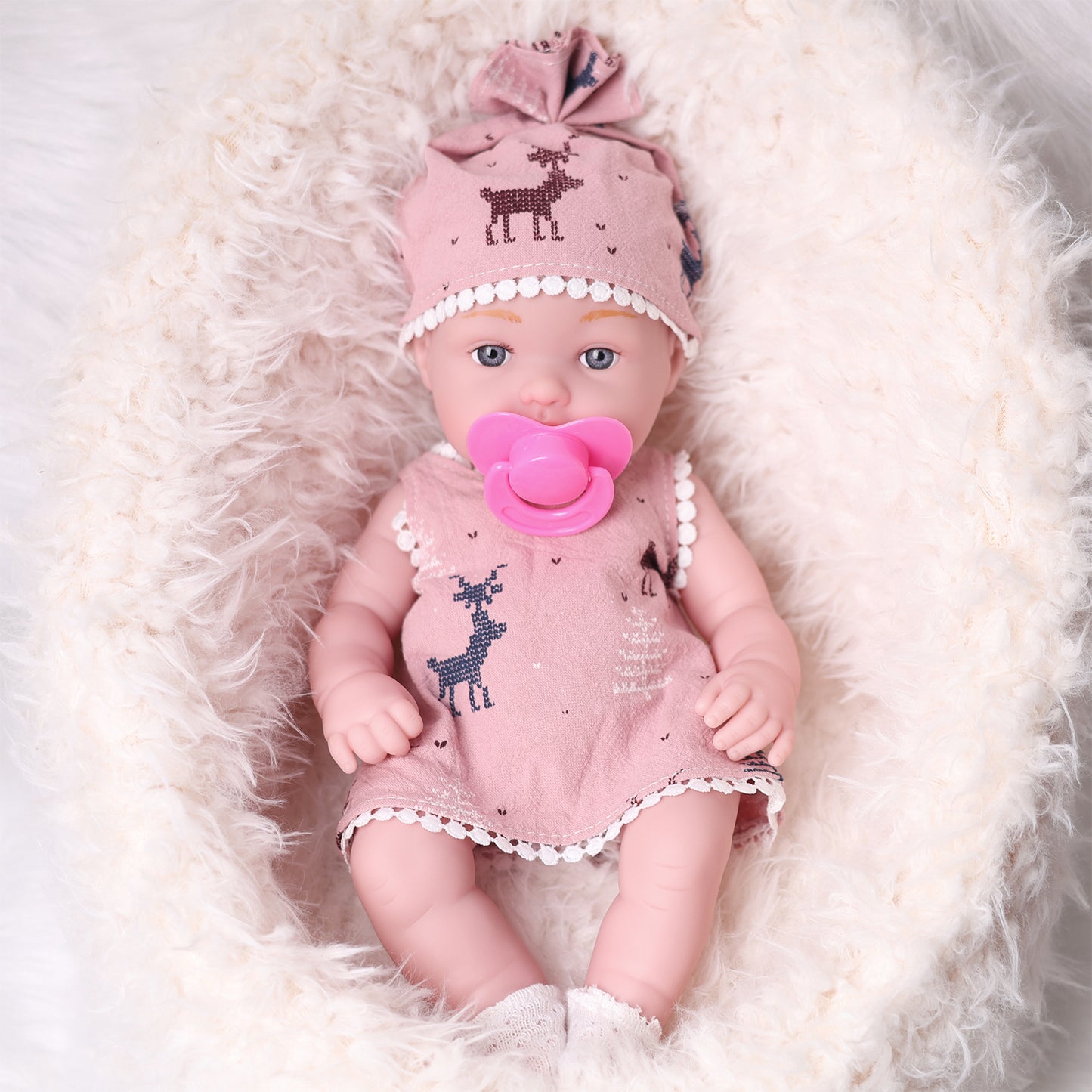 32cm realistic reborn baby doll with pink clothes and pacifier